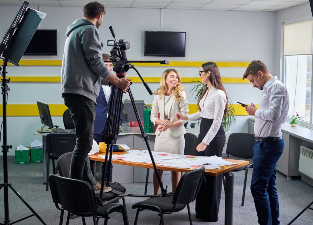 Film director discussing movie plan with the actors